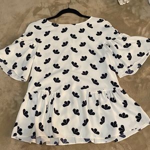 White blouse with black pattern